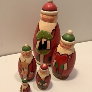 Set of 5 “russian” doll Santa’s in wood.